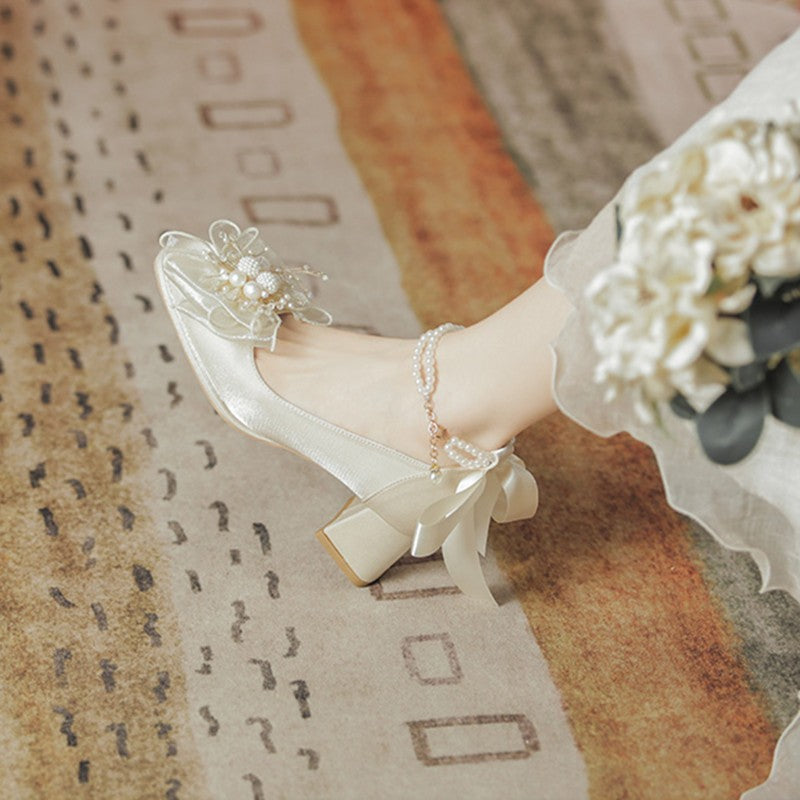 Bow pearl mid-heeled shoes