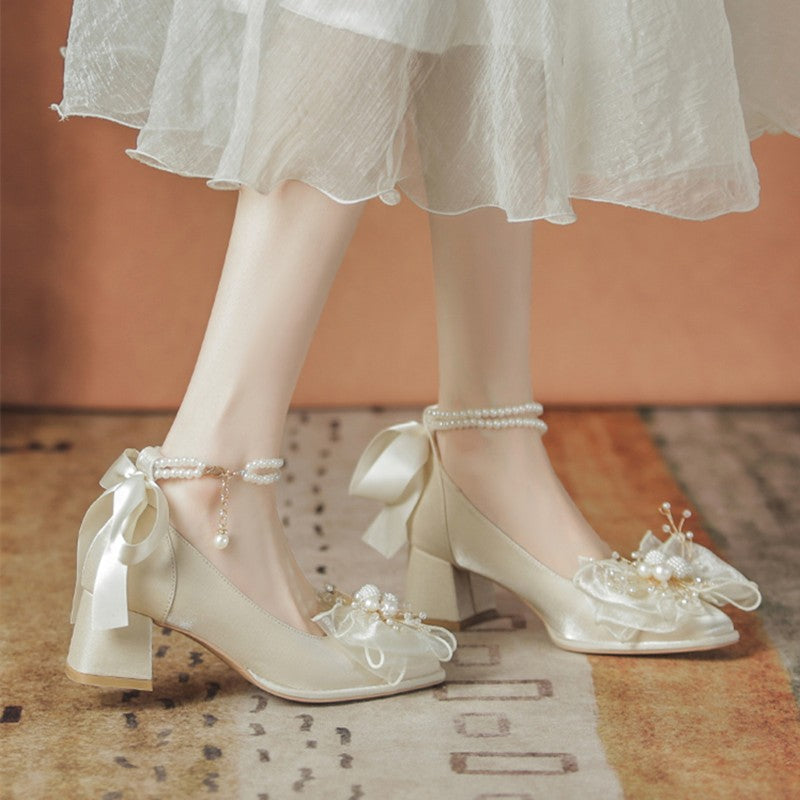 Bow pearl mid-heeled shoes