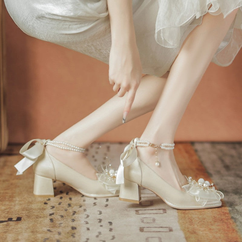 Bow pearl mid-heeled shoes