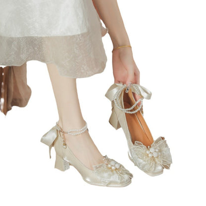 Bow pearl mid-heeled shoes