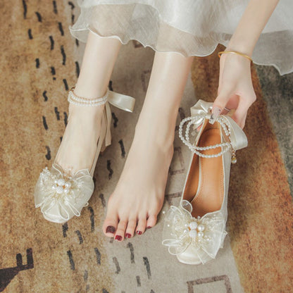 Bow pearl mid-heeled shoes