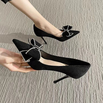 Stiletto pointed toe black bow shoes