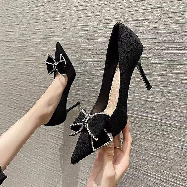 Stiletto pointed toe black bow shoes